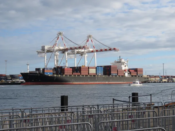 A container ship leaving port